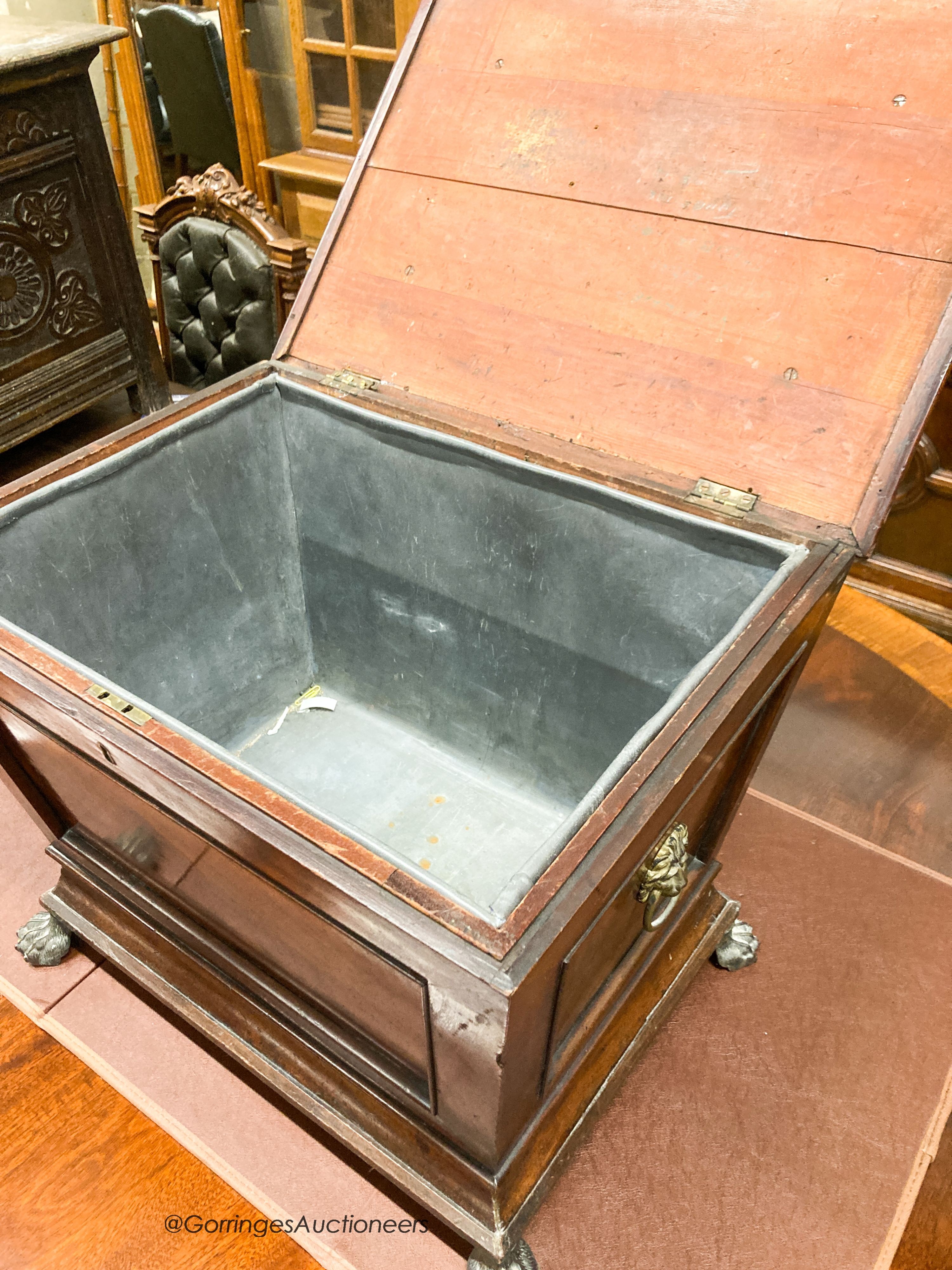 A late Regency mahogany sarcophagus cellarette, width 59cm, depth 43cm, height 50cm